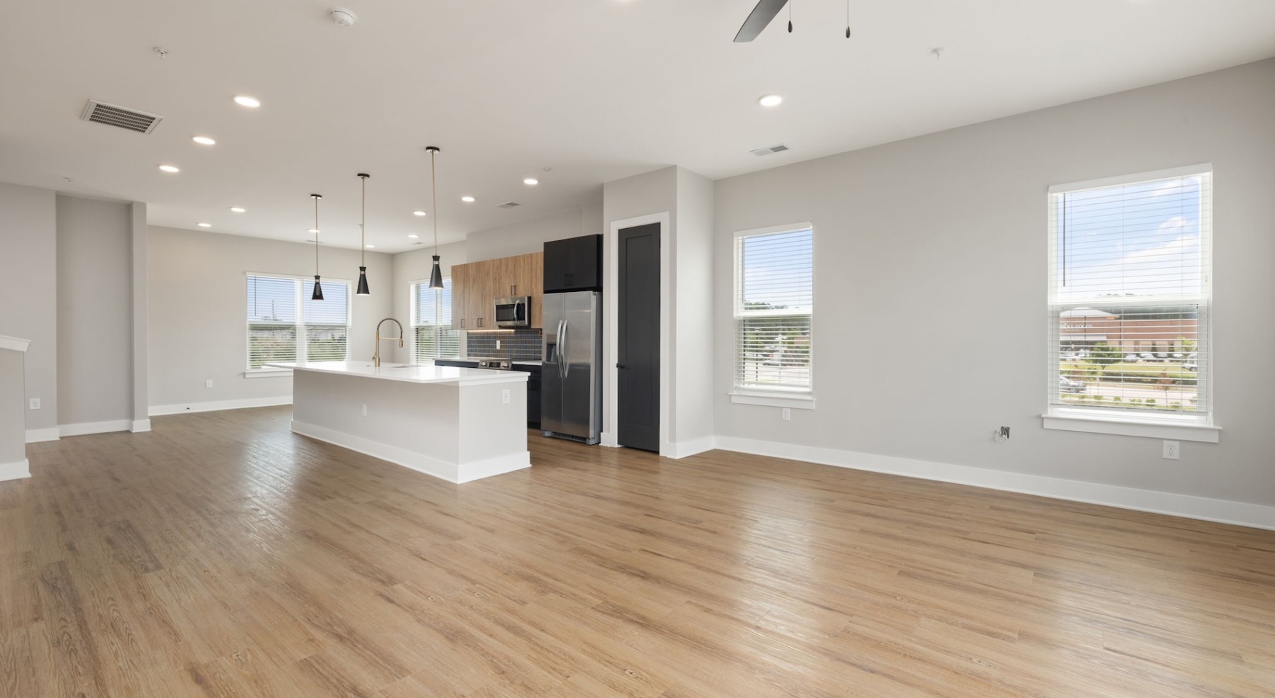 Open space living area with natural lighting